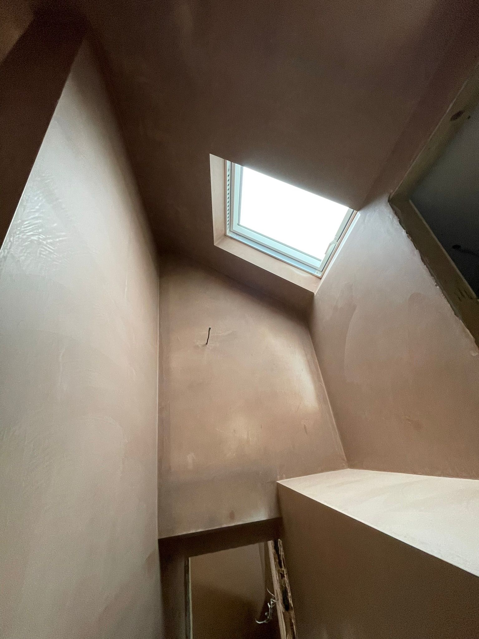 Loft room plaster with skylight
