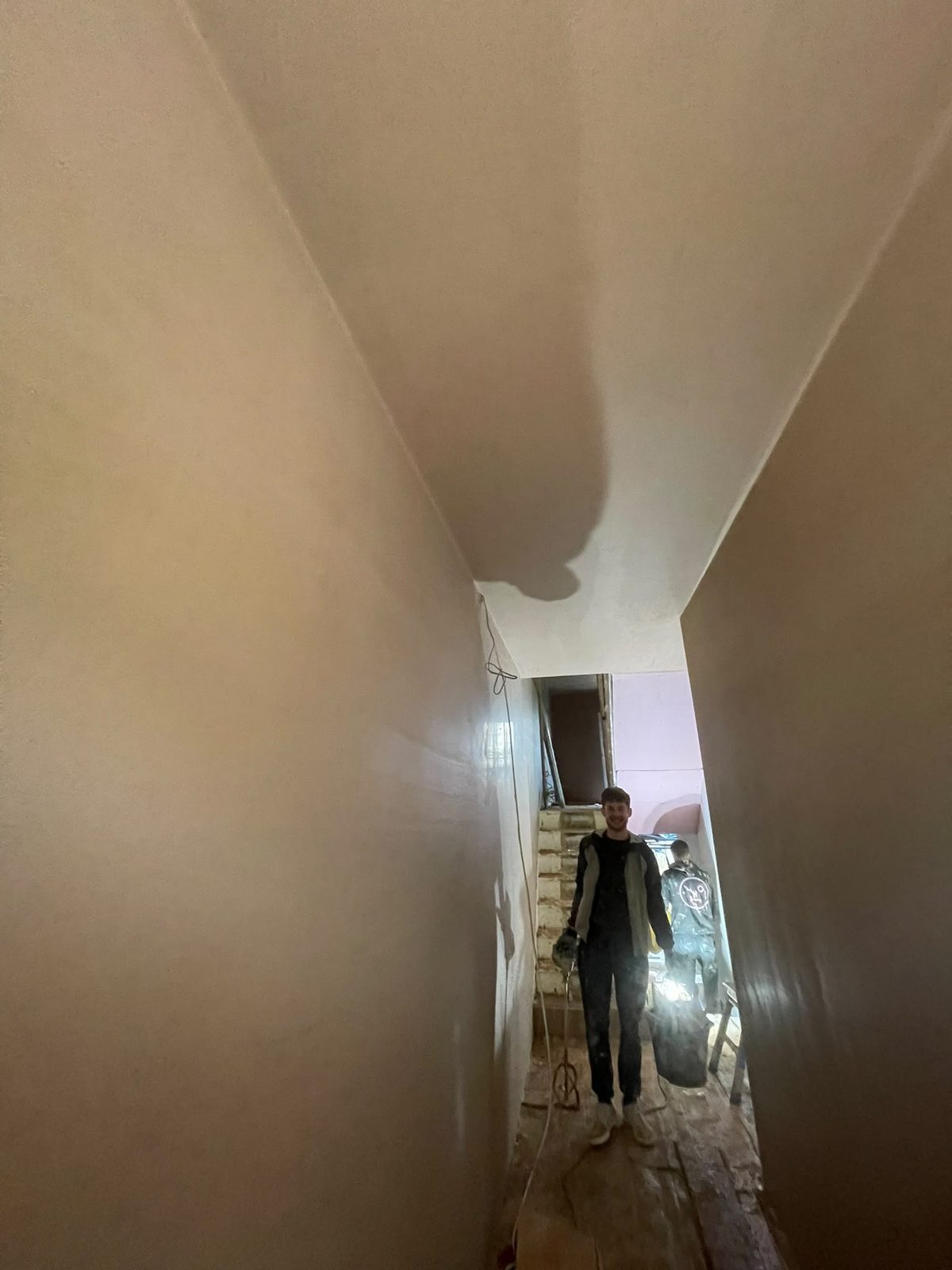 The Kayo team skimming a hallway